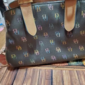 Cute small Dooney and Bourke purse